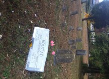 Dad's gravestone with some old markers